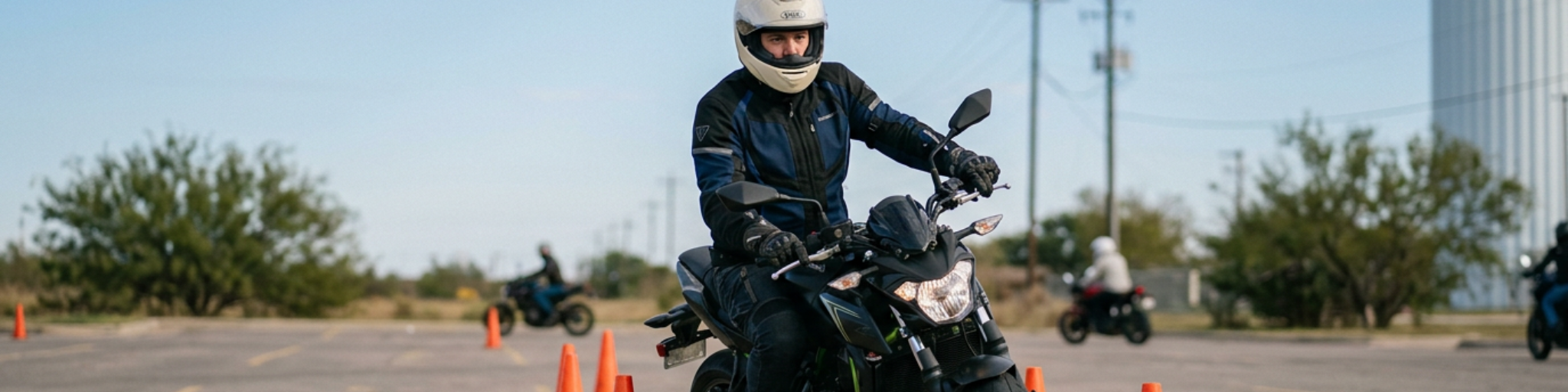 Motorcycle rider in full protective gear practicing low-speed control maneuvers during an MSF safety course training exercise in Texas